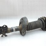 OE Toyota Corolla E21 priekšējais kreisais amortizators 485208Z244