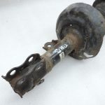 OE Toyota Corolla E21 priekšējais kreisais amortizators 485208Z244