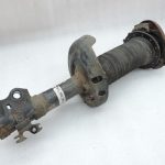 OE Toyota Corolla E21 priekšējais kreisais amortizators 485208Z244