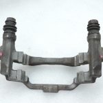 OE Toyota Corolla E21 aizmugurējā labās puses bremžu kluča kronšteins 4782109100