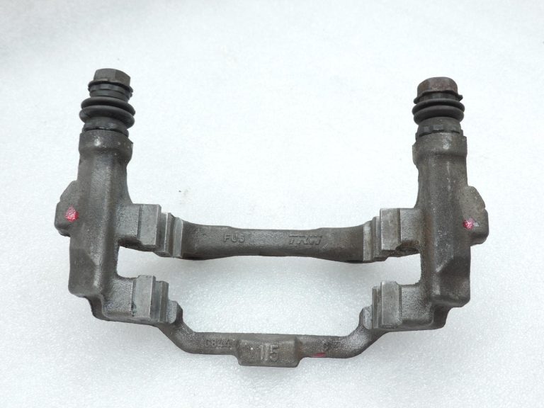 OE Toyota Corolla E21 aizmugurējā labās puses bremžu kluča kronšteins 4782109100