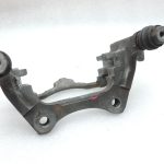 OE Toyota Corolla E21 aizmugurējā labās puses bremžu kluča kronšteins 4782109100