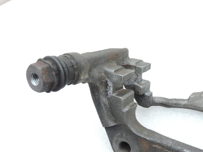 OE Toyota Corolla E21 aizmugurējā labās puses bremžu kluča kronšteins 4782109100