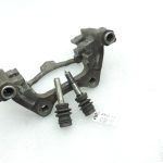 OE Toyota Corolla E21 aizmugurējā labās puses bremžu kluča kronšteins 4782109100