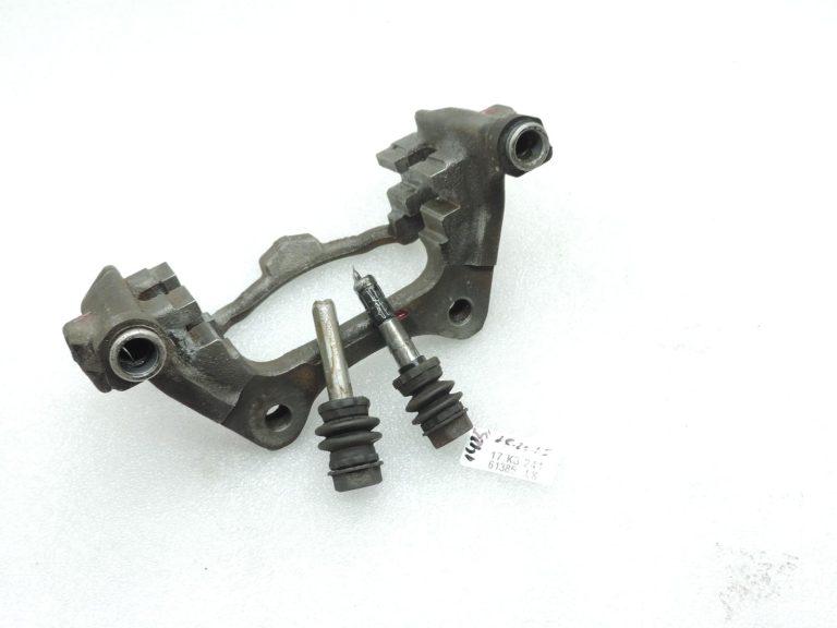 OE Toyota Corolla E21 aizmugurējā labās puses bremžu kluča kronšteins 4782109100
