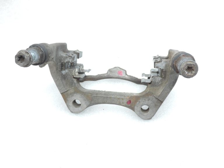 OE Toyota Corolla E21 aizmugurējā kreisā bremžu kluča kronšteins 4782109100