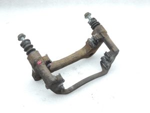 OE Toyota Corolla E21 priekšējā kreisā bremžu kluča kronšteins 4772209260