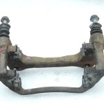 OE Toyota Corolla E21 priekšējā kreisā bremžu kluča kronšteins 4772209260