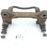 OE Toyota Corolla E21 priekšējā kreisā bremžu kluča kronšteins 4772209260