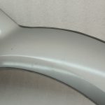 Suzuki Jimny MK3 Aizsargs pret šļakatām aizmugurējais kreisais 7765081A00