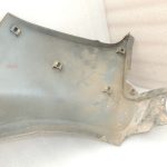 Suzuki Jimny MK3 Aizsargs pret šļakatām aizmugurējais kreisais 7765081A00