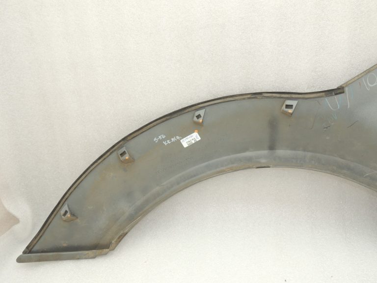 Suzuki Jimny MK3 Aizsargs pret šļakatām aizmugurējais kreisais 7765081A00