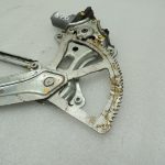 Toyota Hilux VII Priekšējā kreisā loga regulatora sliede ar motoru 69820-0K041