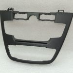 Opel Insignia A centrālās konsoles radio klimata kontroles slēdžu panelis 13273253