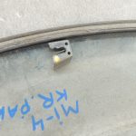 Oriģinālās Mitsubishi Pajero V78W aizmugurējā kreisā dubļusarga apdare balta MN117225