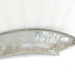 Oriģinālā Mitsubishi Pajero V78W aizmugurējā labā dubļusarga apdare sudraba krāsā A69C MR47875