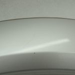 Oriģinālās Mitsubishi Pajero V78W aizmugurējā kreisā dubļusarga apdare sudraba krāsā A69C MR478749