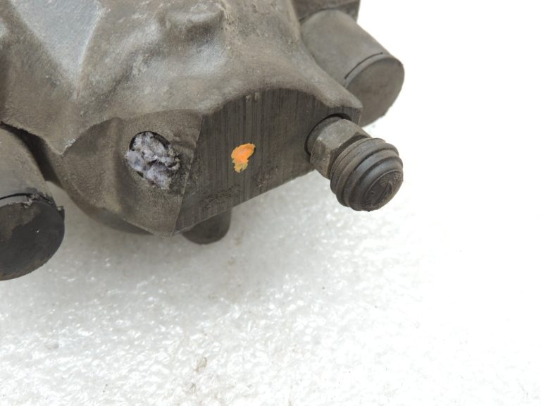 Oriģinālais Mercedes W212 aizmugurējais kreisais bremžu suports A2124230081