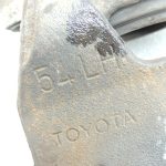 Toyota Yaris IV XP210 bremžu suports priekšējais kreisais 47750K0030