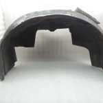 Nissan Navara II D40 2010-2013 Priekšējā kreisā iekšējā riteņa arkas ieliktnis 638413X00A