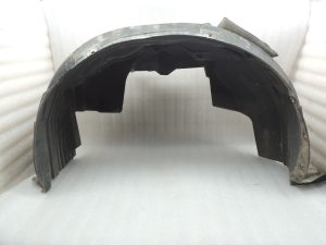 Nissan Navara II D40 2010-2013 Priekšējā kreisā iekšējā riteņa arkas ieliktnis 638413X00A