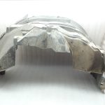 Nissan Navara II D40 2010-2013 Priekšējā kreisā iekšējā riteņa arkas ieliktnis 638413X00A