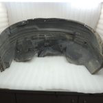 Nissan Navara II D40 2010-2013 Priekšējā kreisā iekšējā riteņa arkas ieliktnis 638413X00A