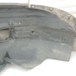 Nissan Navara II D40 2010-2013 Priekšējā kreisā iekšējā riteņa arkas ieliktnis 638413X00A