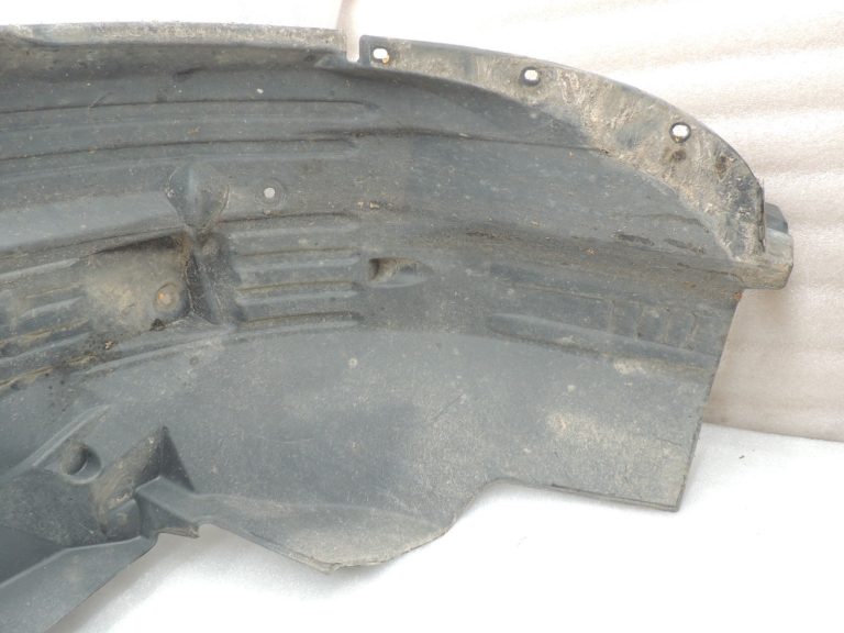 Nissan Navara II D40 2010-2013 Priekšējā kreisā iekšējā riteņa arkas ieliktnis 638413X00A