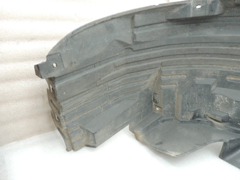 Nissan Navara II D40 2010-2013 Priekšējā kreisā iekšējā riteņa arkas ieliktnis 638413X00A