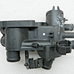VW Golf oriģinālais termostata korpuss