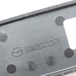 Mazda 6 GJ Priekšējais labās grīdas apakšējais numurs Rāmja rāmja numura vāciņš
