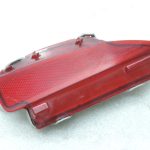Oriģinālais 2011-2014 Toyota Yaris P13 aizmugurējais kreisais atstarotājs 815900D060