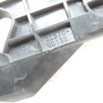 Oriģināls 2011-2014 Toyota Yaris P13 aizmugurējā bampera kronšteins kreisais 525760D130