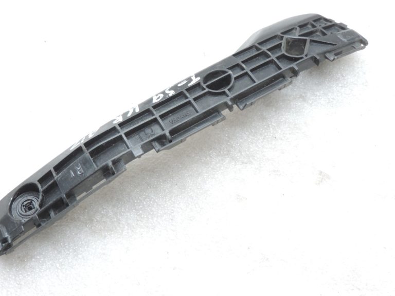 Oriģināls 2011-2014 Toyota Yaris P13 aizmugurējā bampera kronšteins kreisais 525760D130