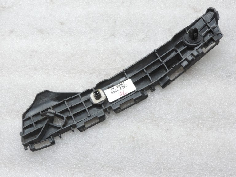 Oriģināls 2011-2014 Toyota Yaris P13 aizmugurējā bampera kronšteins kreisais 525760D130